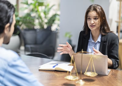 Lawyer discussing AML with client